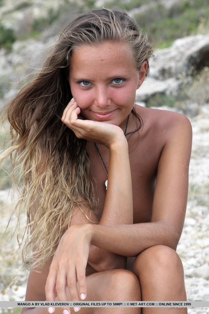 Solo girl Mango A modeling naked on rocky beach after disrobing порно фото #427427498