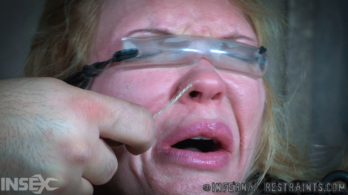 Blonde woman Rain Degrey is subjected to complete humiliation while being held captive in a hidden dungeon.