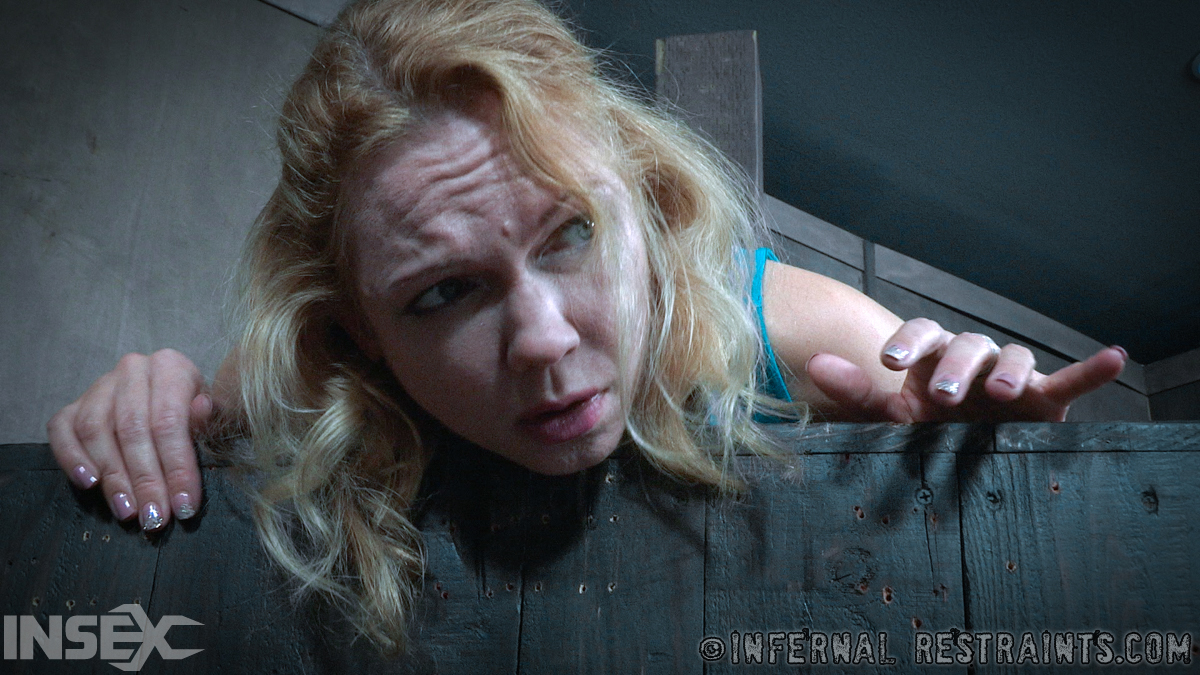 While held captive in a dungeon hole, the blonde woman Rain Degrey is completely humiliated.