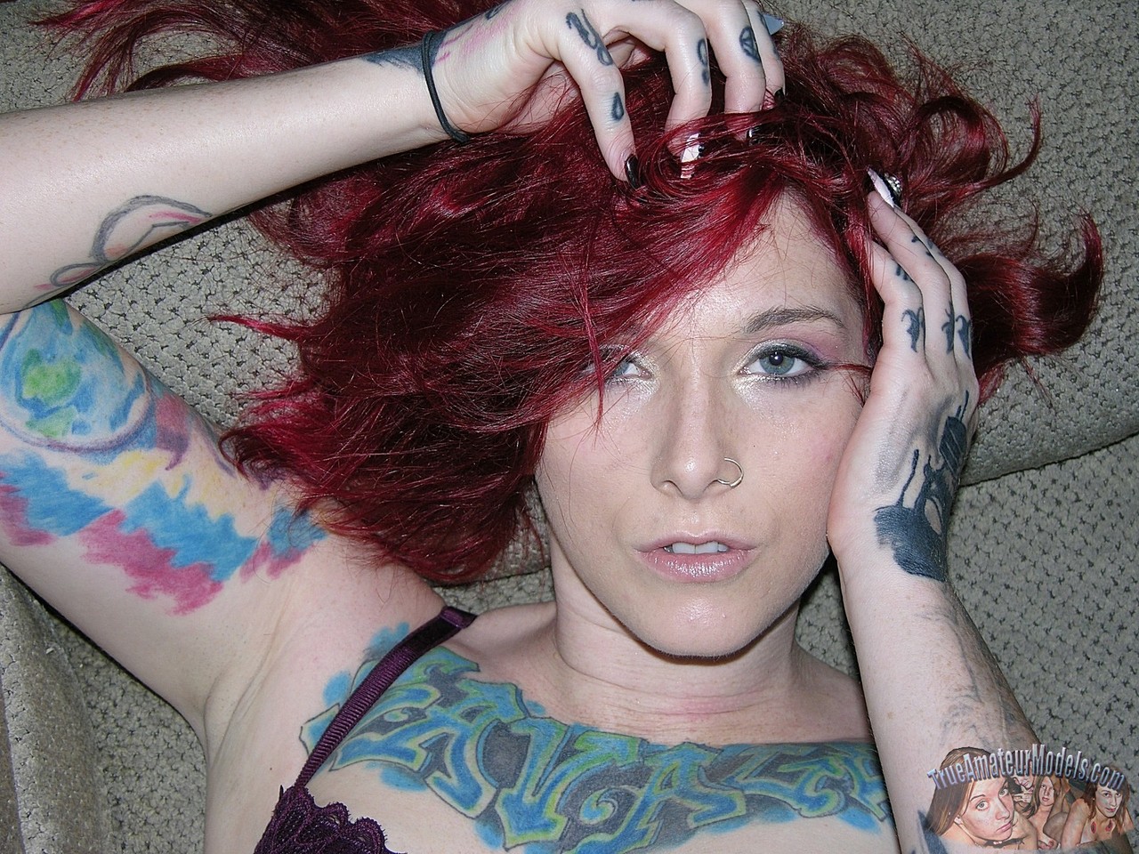 Tattooed redhead Lola takes off her glasses and clothes for her first nudes porno foto #426299018