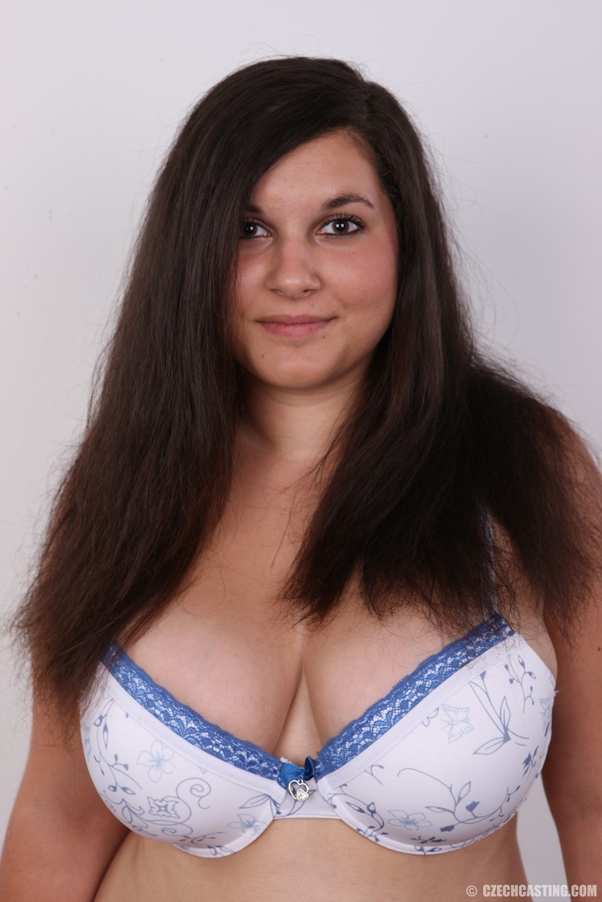 Overweight brunette Lucie undresses to fulfill dreams of becoming a nude model porn photo #429091368