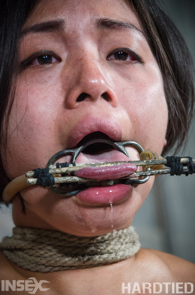 Asian Girl Milcah Halili Drools Spit While Restrained In A Dungeon