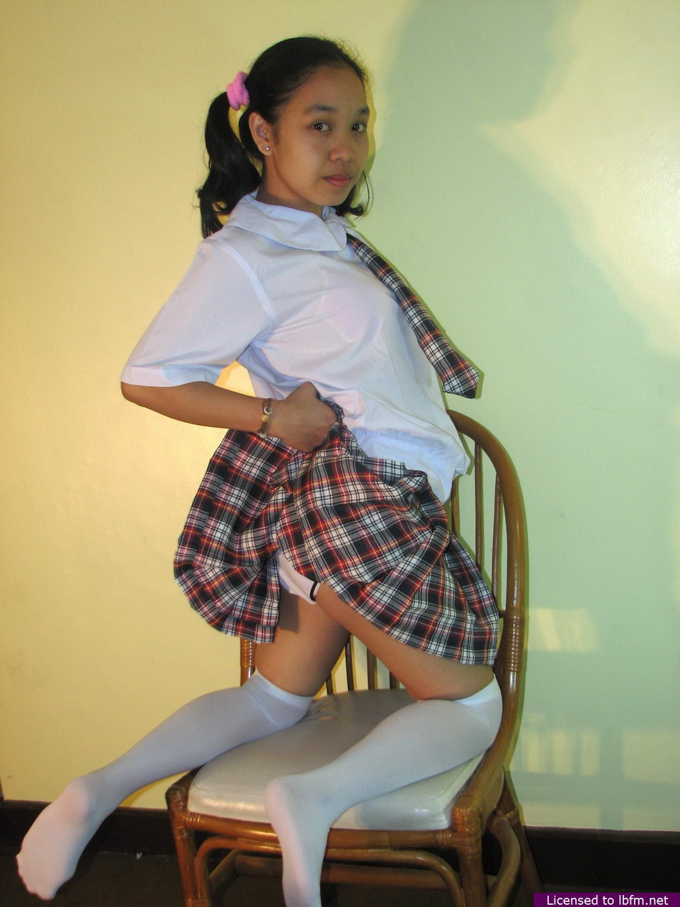 Asian Schoolgirl Maryjane Shows Her Bald Cunt On A Chair In Otk Socks