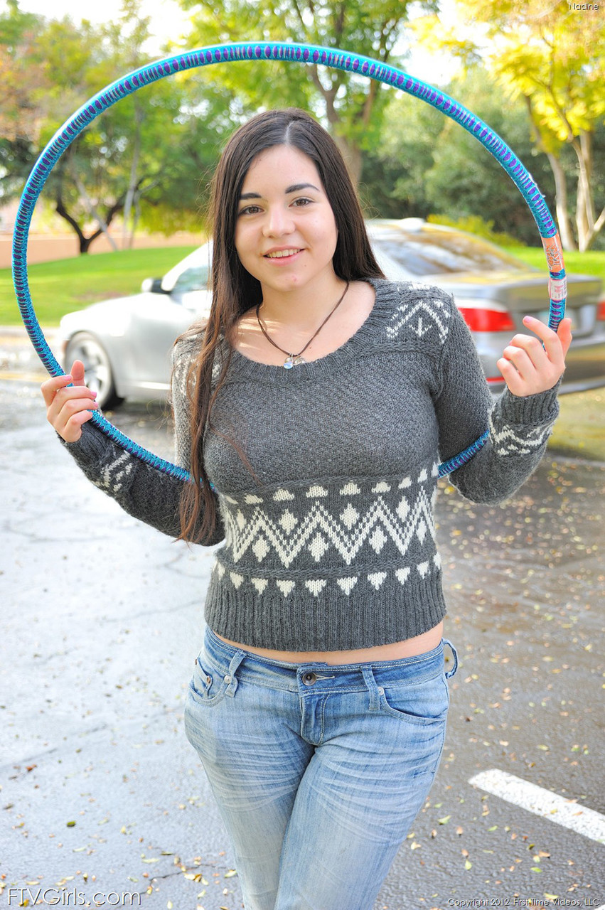 Chubby brunette takes off all her clothes in public while working a hula hoop porno foto #424172601