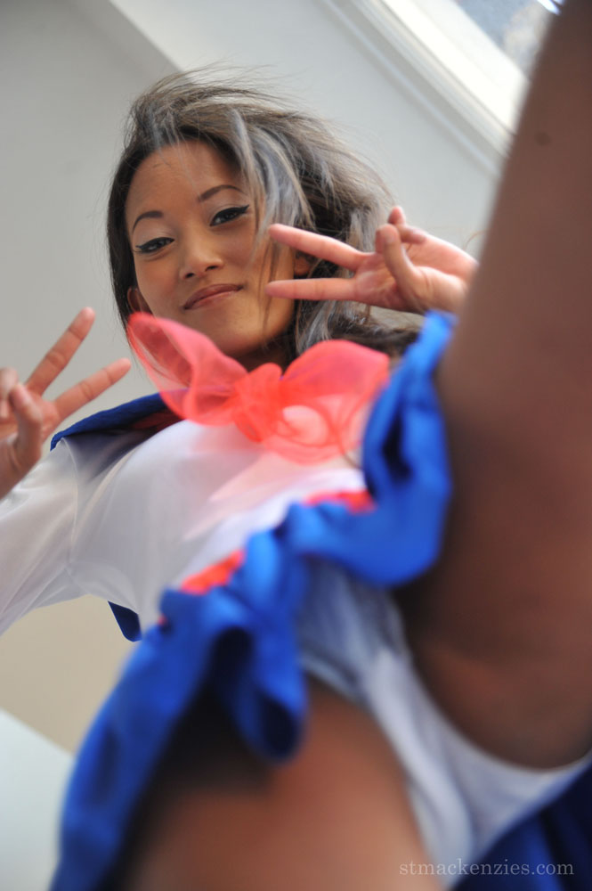 Cute teen Asian removes her schoolgirl uniform to spread in socks & heels foto porno #423789780
