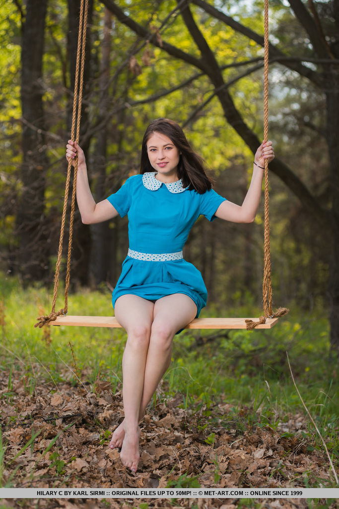 Young brunette Hilary C is encouraged to get naked on swing set in forest porno fotky #425338916
