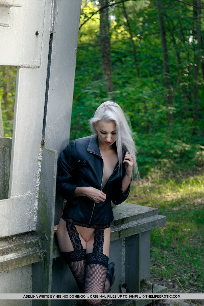 European teen Adelina White takes a pee on trestle bridge in black stockings foto porno #424758310