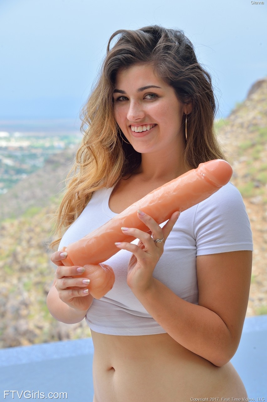 Cute teen girl inserts a huge dildo into her pussy before self fisting zdjęcie porno #423405518
