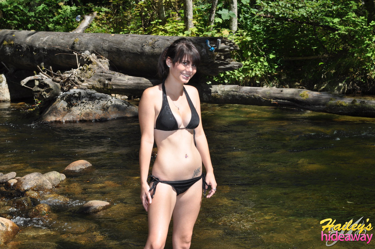 Brunette amateur Hailey removes her bikini to show wet nice tits in the river порно фото #425644061