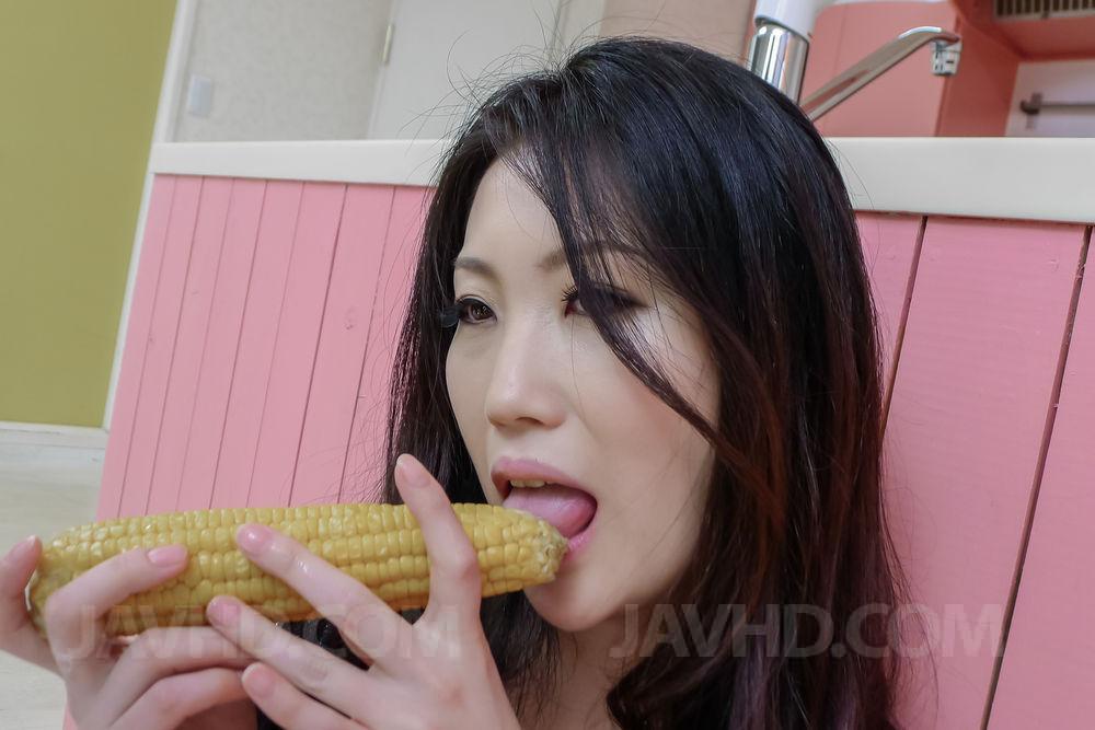 Naomi Sugawara licks corn before fucking her love box with it photo porno #425491711