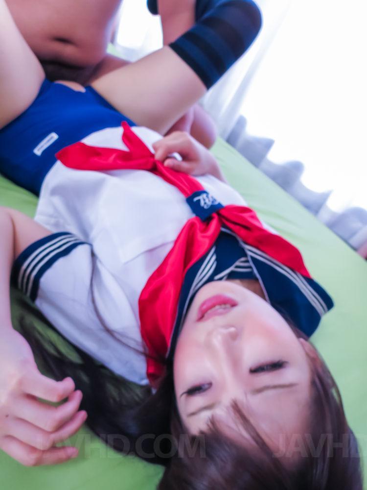 Japanese schoolgirl Yuri Sakurai has sex while wearing striped thigh highs porn photo #427080800