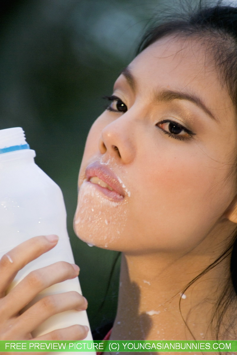Sexy Asian girl gets milk all over her pretty face and nice breasts ポルノ写真 #426855980