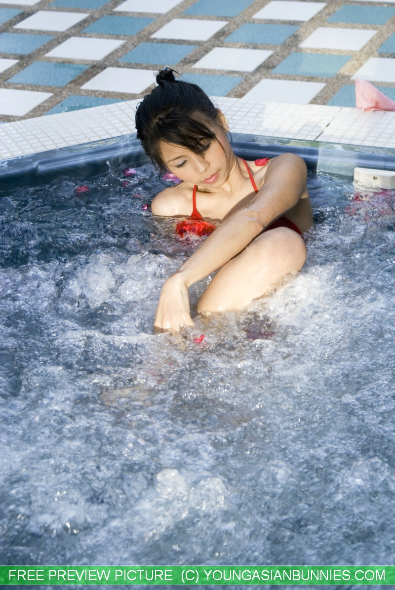 Young Japanese Girl Tales Off Her Bikini In An Outdoor Hot Tub