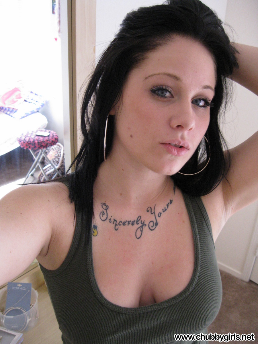 Dark Haired Amateur Pulls Out Her Big Naturals And Licks Her Nips In Selfies