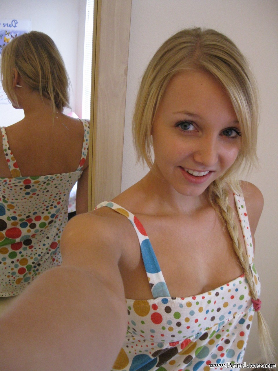 Blonde first timer exposes her tits and twat for self shots in the mirror photo
