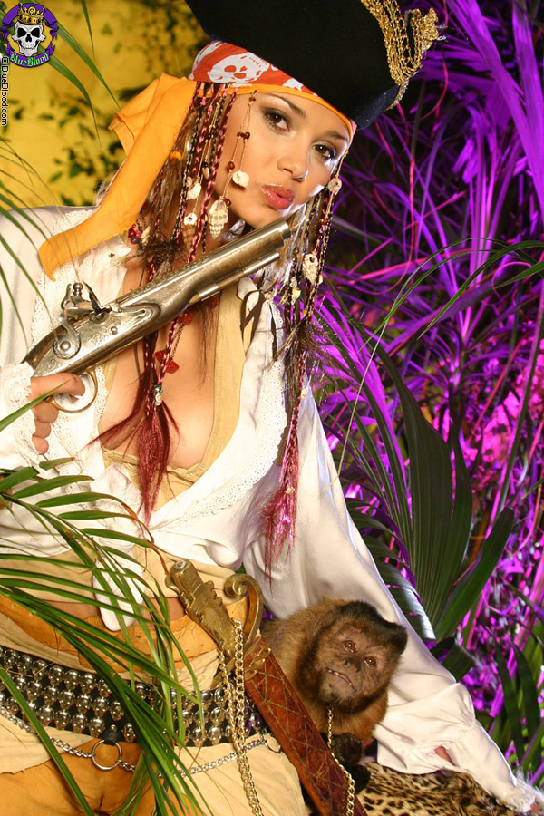 Beautiful female pirate Lenka exposes herself amid a lush backdrop porn photo #423251417