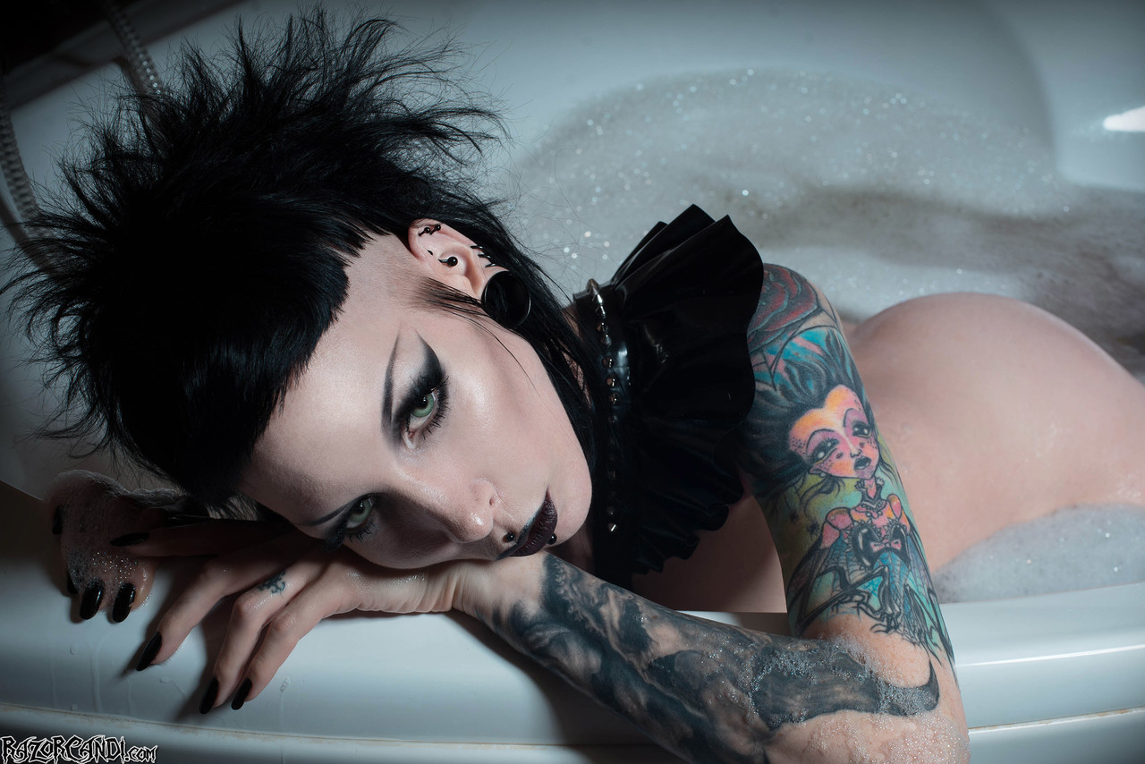 Alternative model Razor Candi gets into a bathtub during a solo engagement.