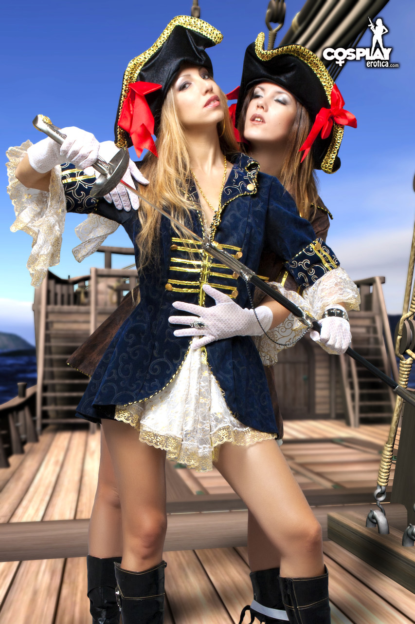 Female pirates partake in lesbian foreplay while on board a vessel porn photo #429084723