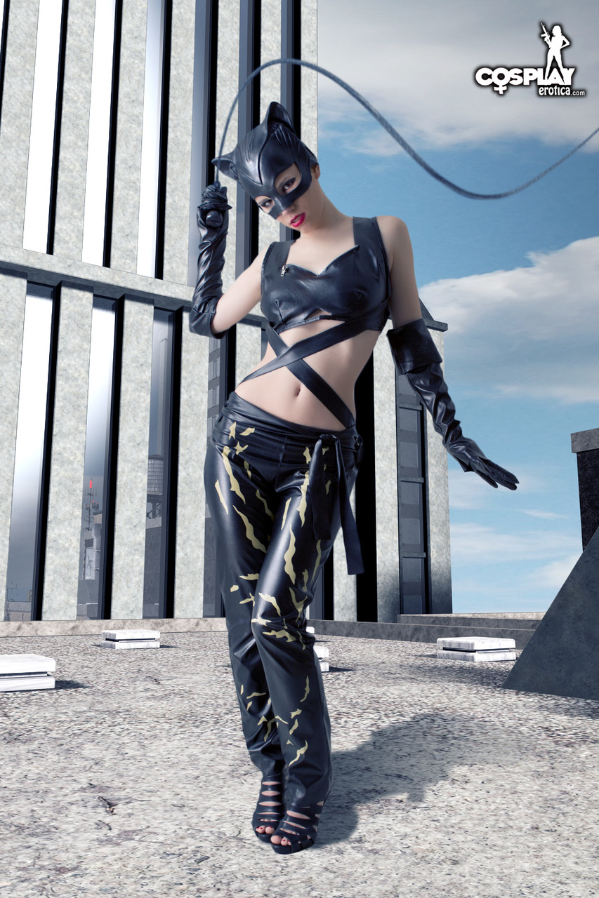 Beautiful girl gets naked in a leather Catwoman hood on a rooftop foto porno #424828424