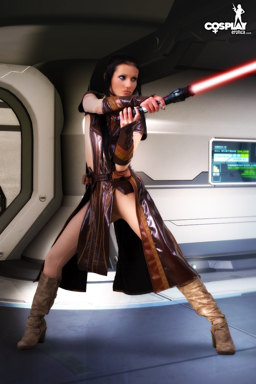 Hot girl wields a lightsaber before masturbating in cosplay clothing porno foto #423153508