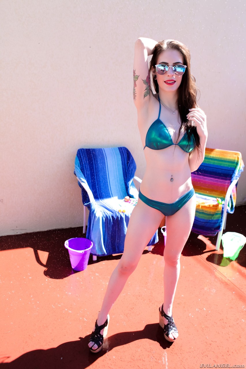 Pale female Anna De Ville takes off her bikini to go naked in a pool photo porno #427517755