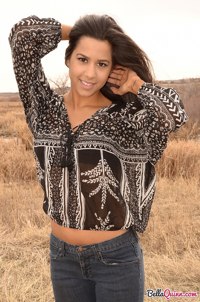 Latina girl Bella Quinn models in a field wearing a bra and jeans foto porno #427630132