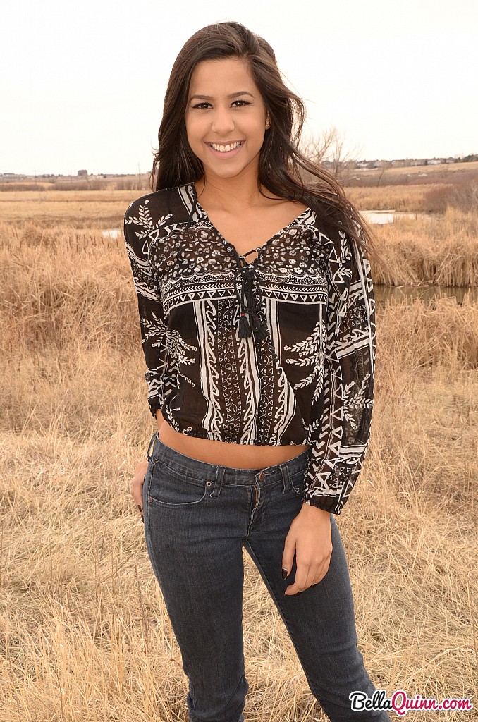 Latina girl Bella Quinn models in a field wearing a bra and jeans foto porno #427630160