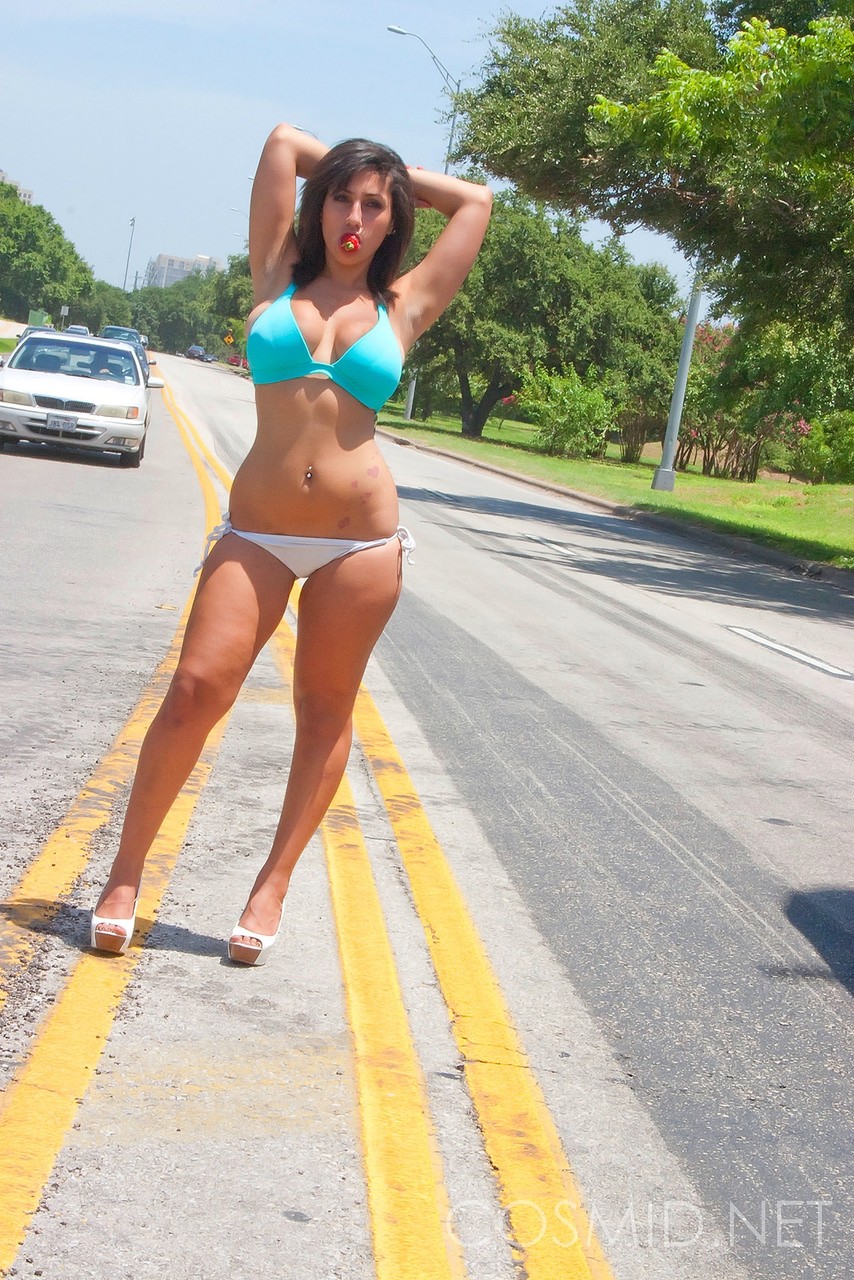 Brunette amateur Shami Halil models a bikini in the middle of a busy road porn photo #425568854