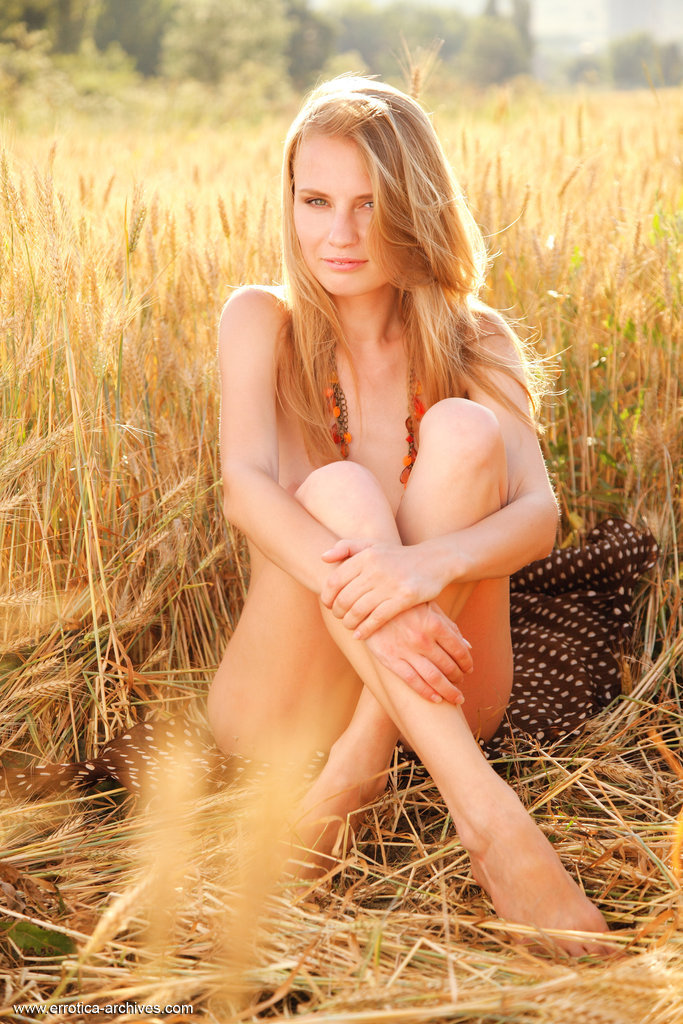 Young blonde beauty Frida C models naked while in a field of wheat porn photo #426321449