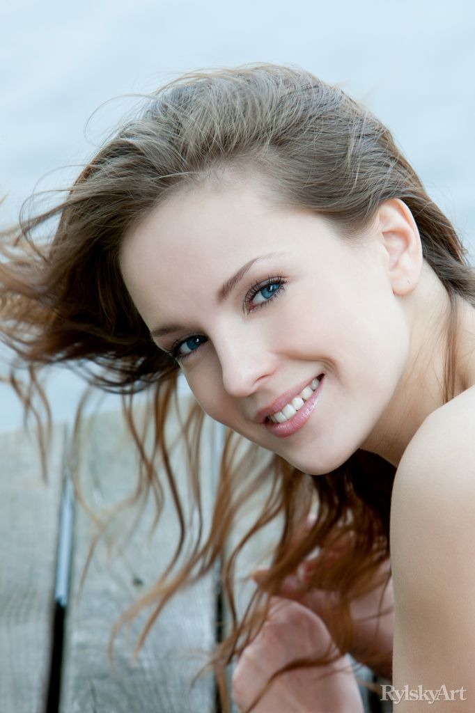Euro model Ilze wears a smile on pretty face during nude posing on dock foto porno #425935411