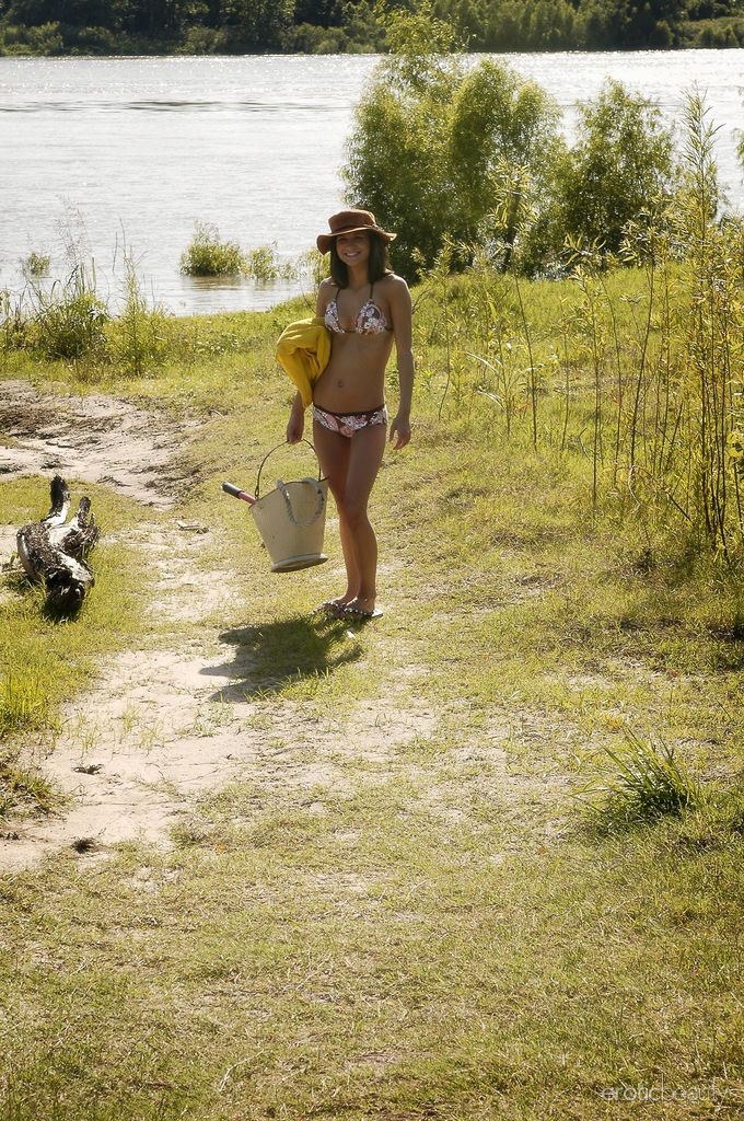 Teen solo girl Elela takes off her bikini before wading into river porn photo #428593073