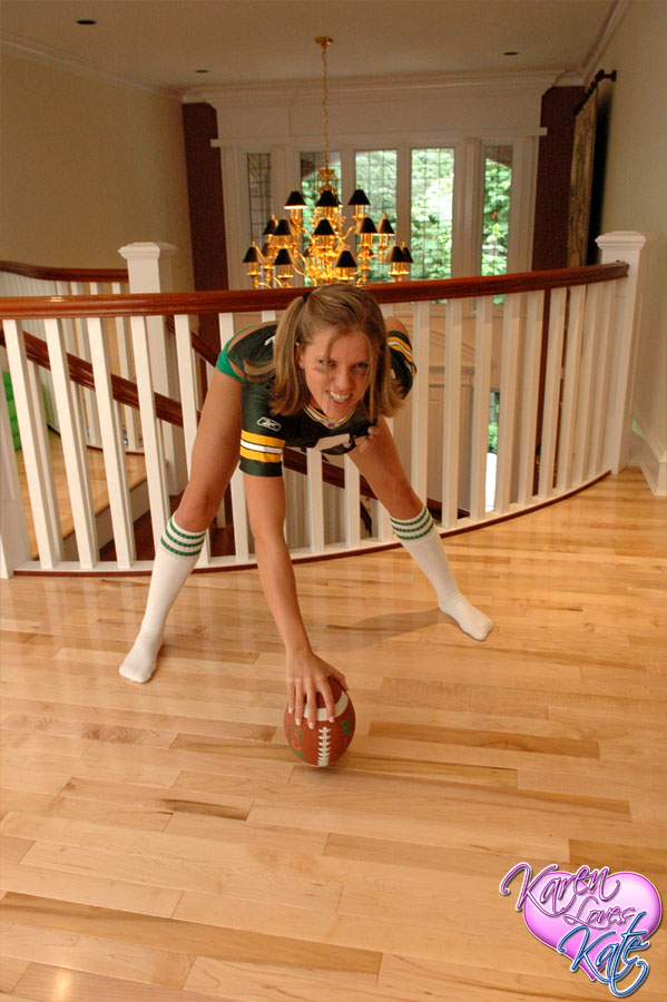 Amateur dykes Karen and Kate have a game of football in knee socks and panties porn photo #425200356