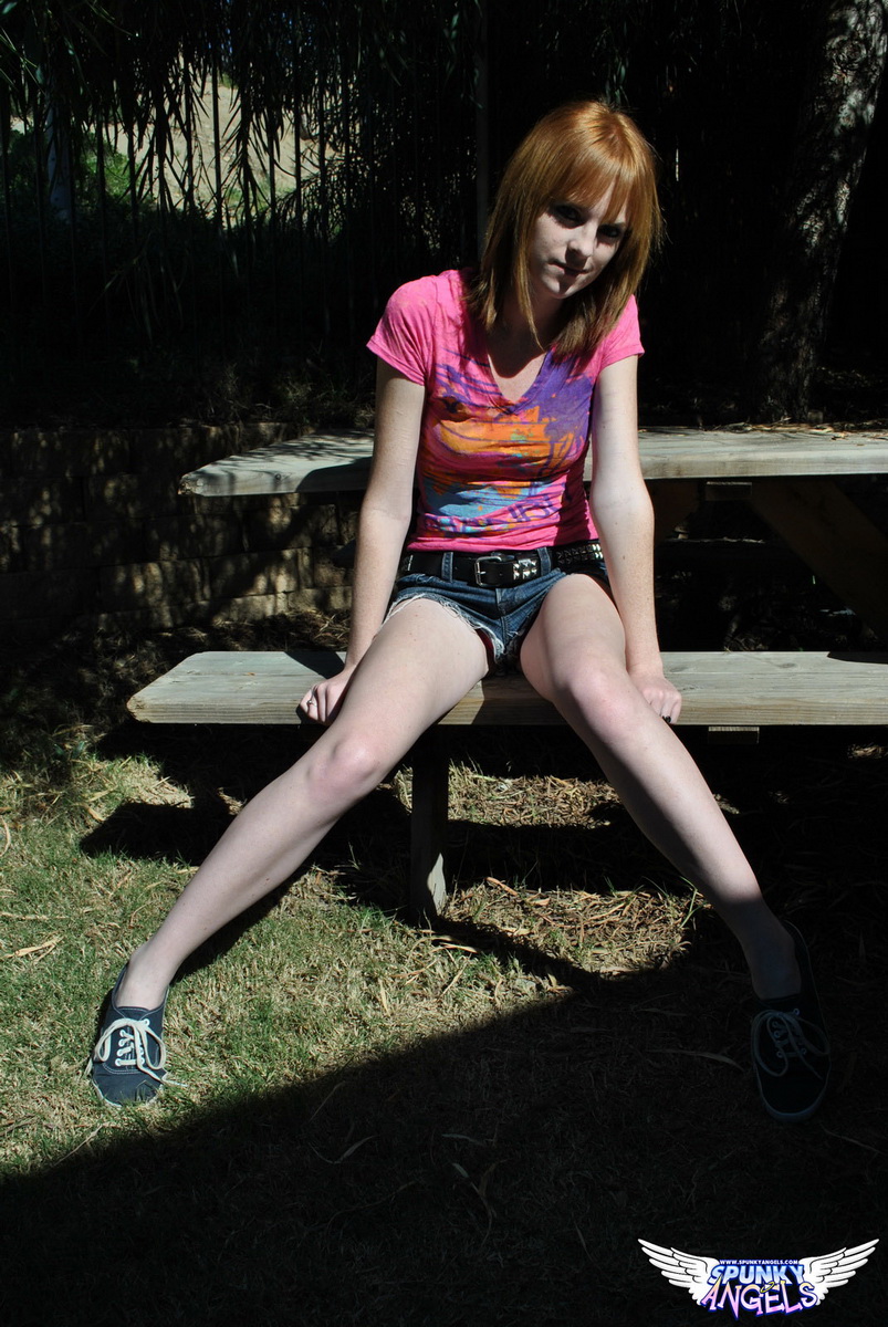 Young Redhead Kate Cooper Hikes Her Skirt And Flashes Her Twat Against A Fence