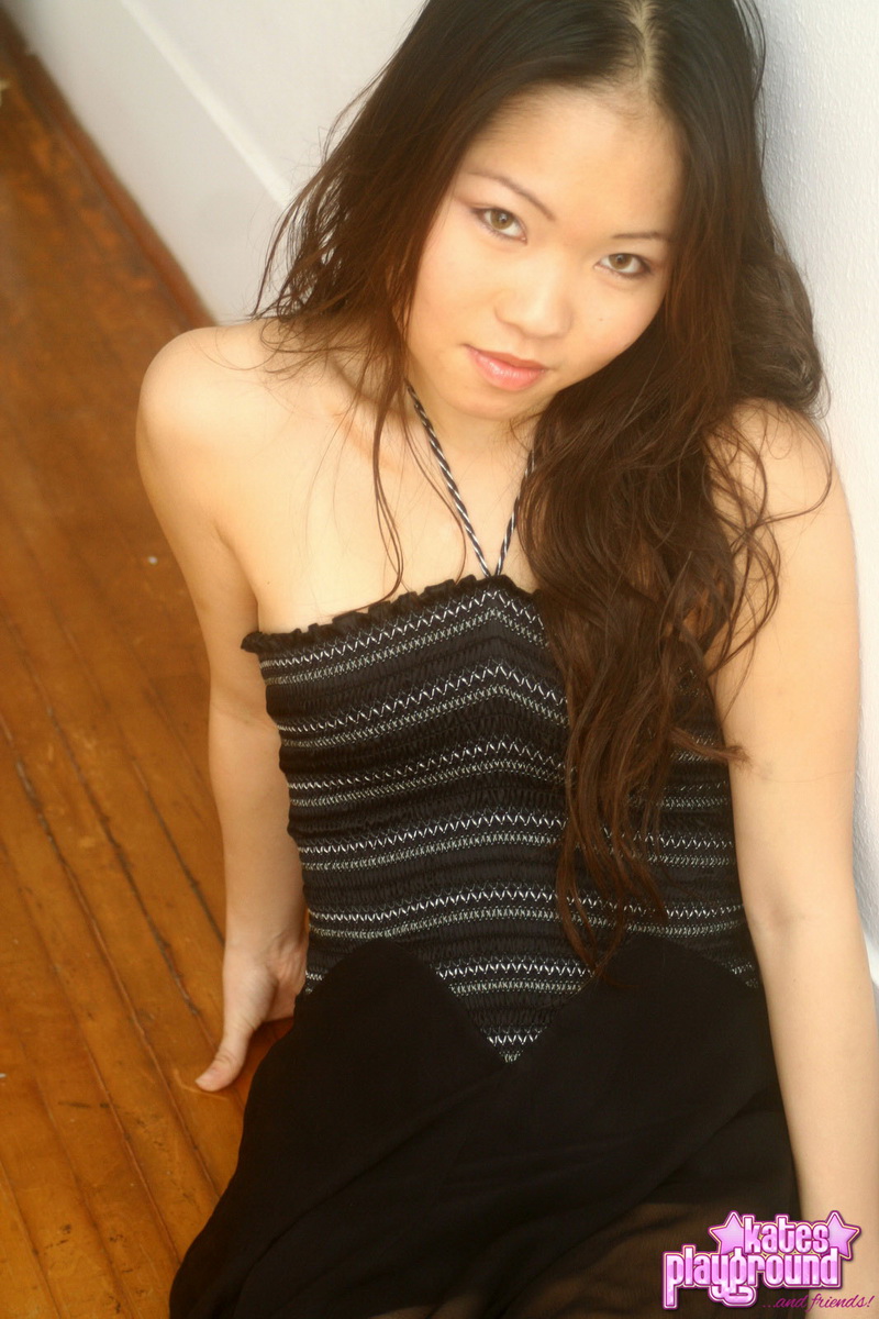 Asian Amateur Grace Shows Her Bare Legs With Her Long Skirt Hitched Up
