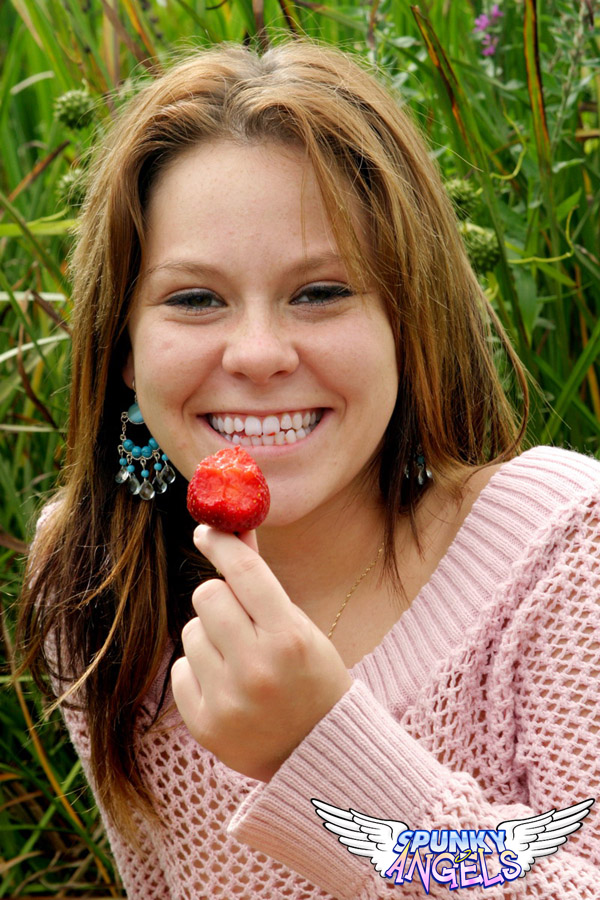 18 year old munches on strawberries after exposing her panties in long grass porn photo #427200090