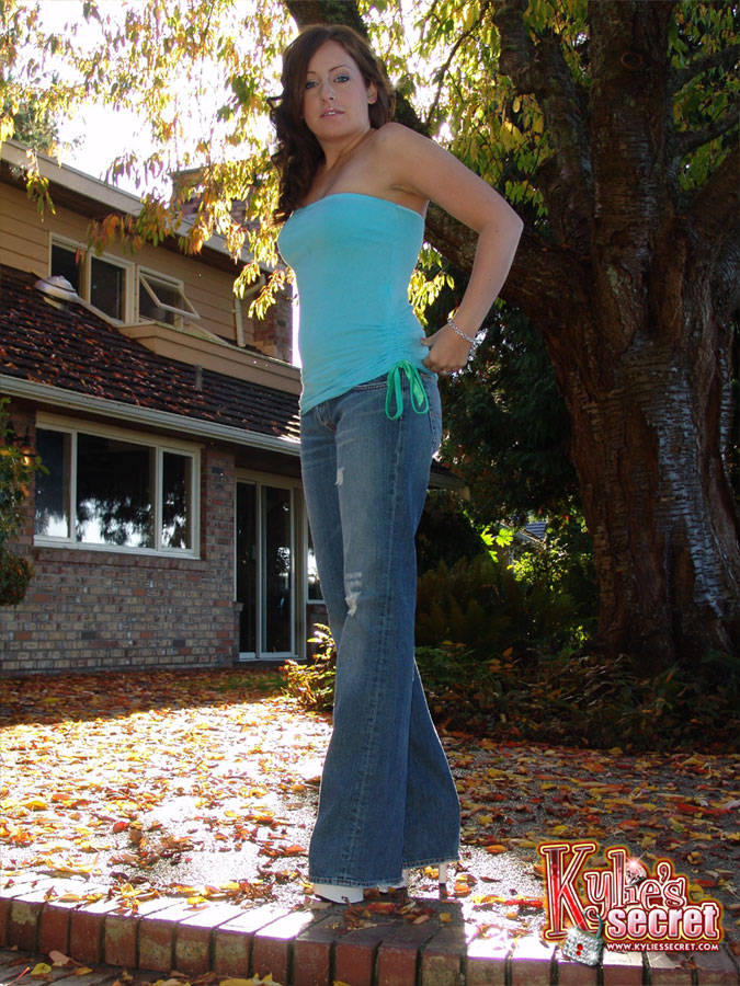 Redheaded SFW model Kylies Secret goes topless outdoors in blue jeans photo porno #425144225