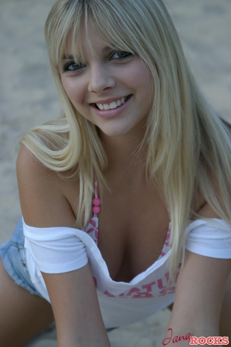 Cute Blonde Jana Jordan In A Short Skirt Flashing Cleavage At The Beach