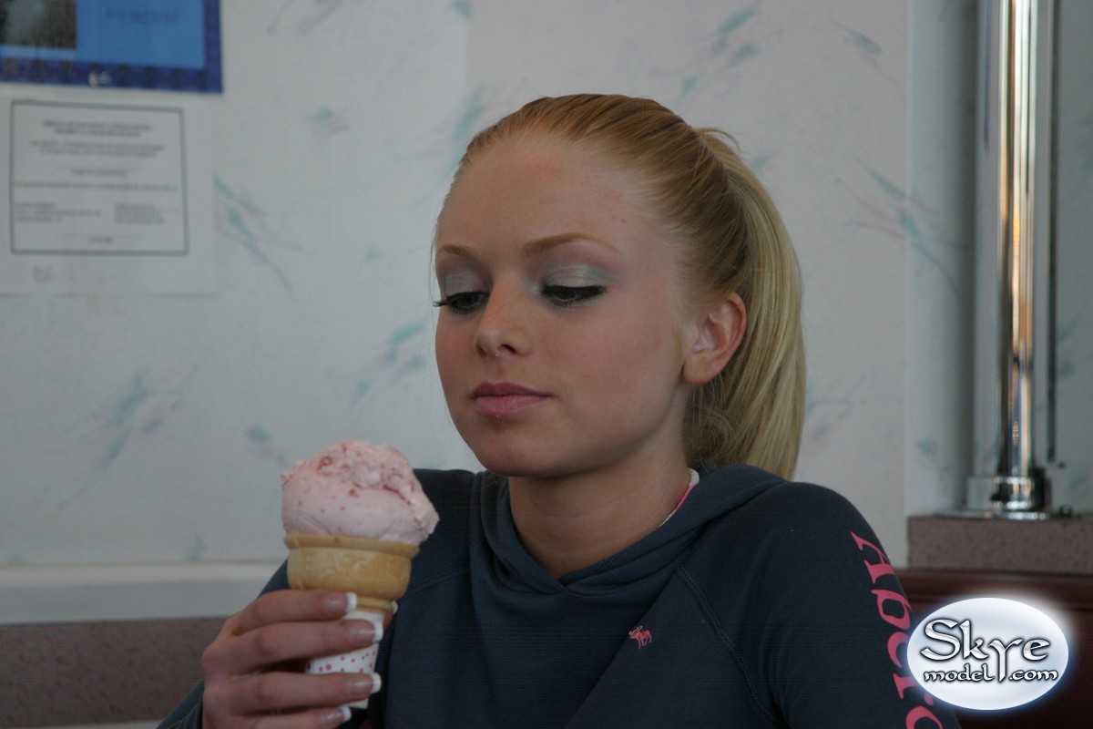 Beautiful young teen amateur Skye Model erotically licking an ice cream cone porn photo #426975318