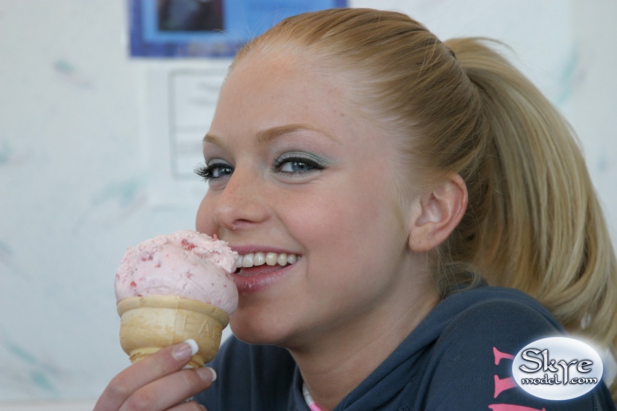 Beautiful young teen amateur Skye Model erotically licking an ice cream cone porn photo #426975319