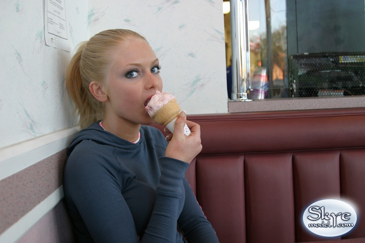 Beautiful young teen amateur Skye Model erotically licking an ice cream cone porn photo #426975367