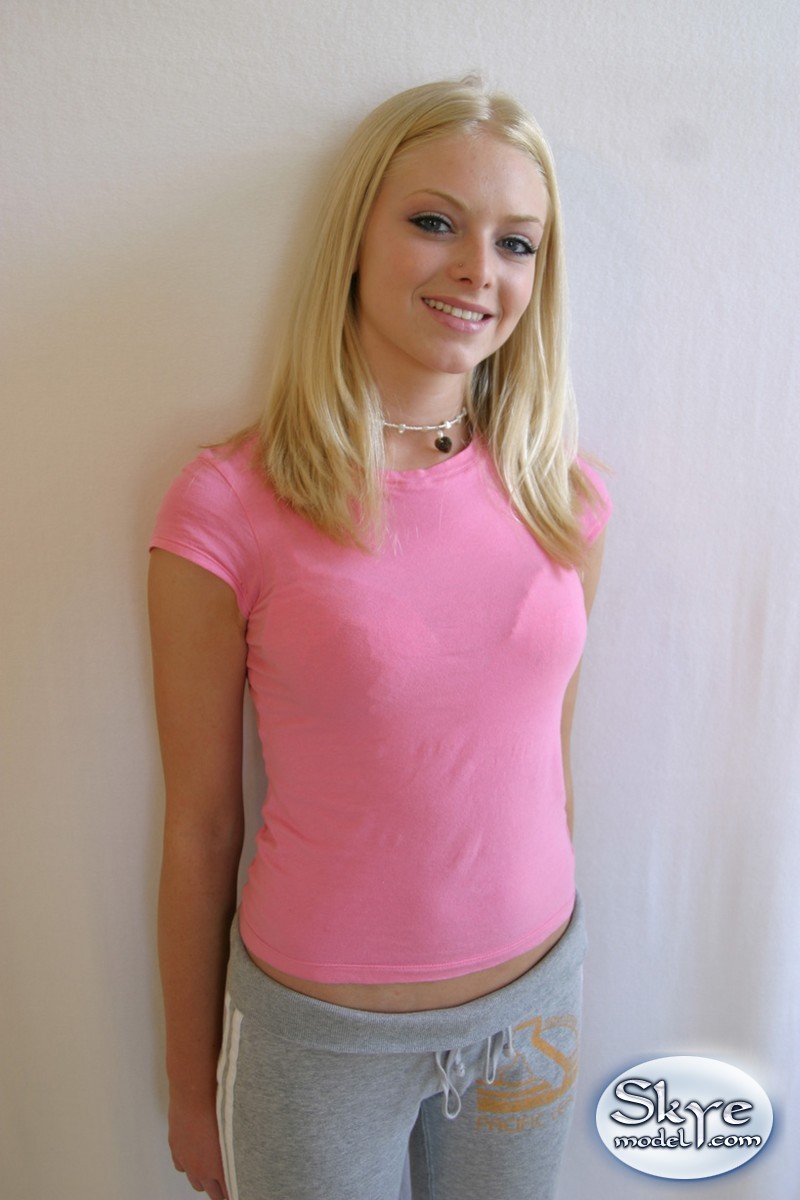 Cute teen girl Skye Model hangs out in a pink shirt and her yoga pants porn photo #424239399