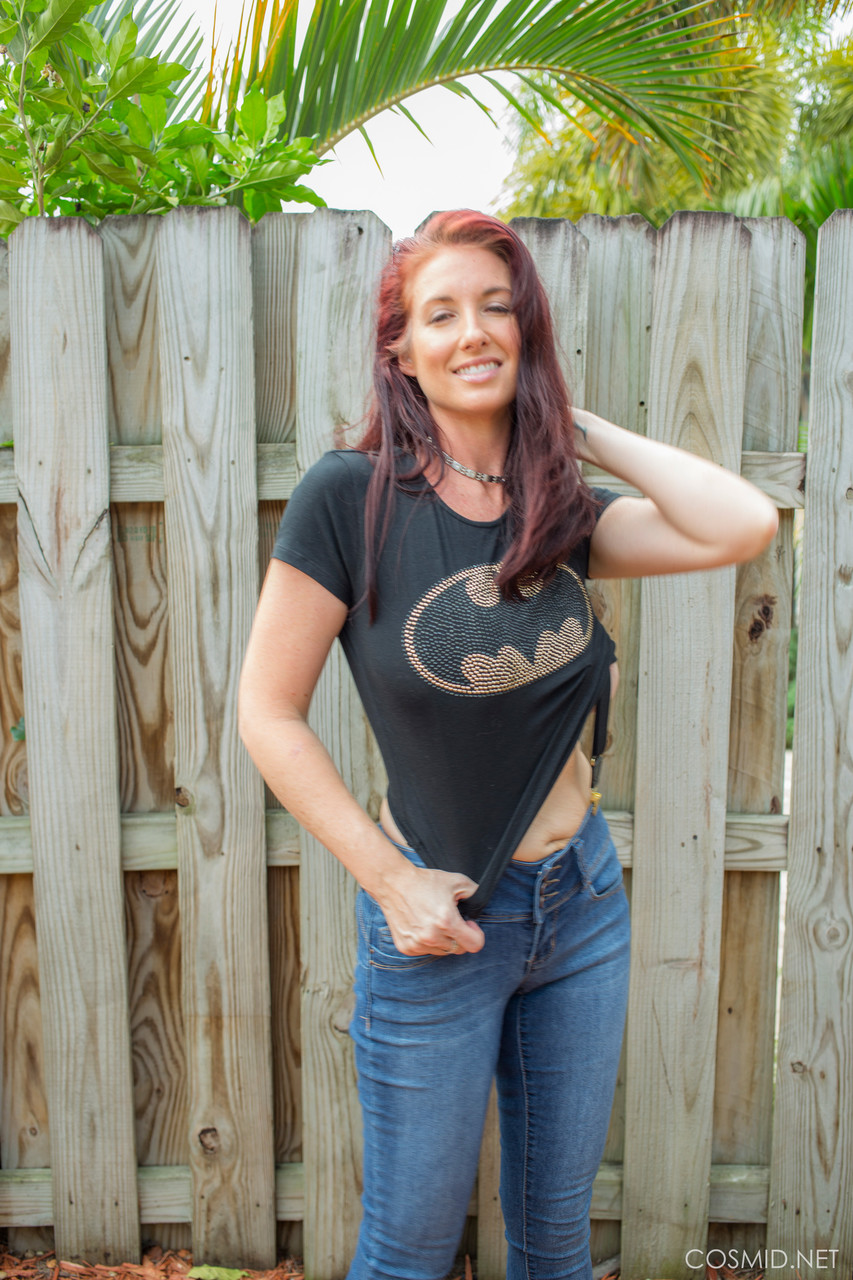 Hot redhead Andy Adams loses her t-shirt & jeans in the yard to pose naked porn photo #425118945