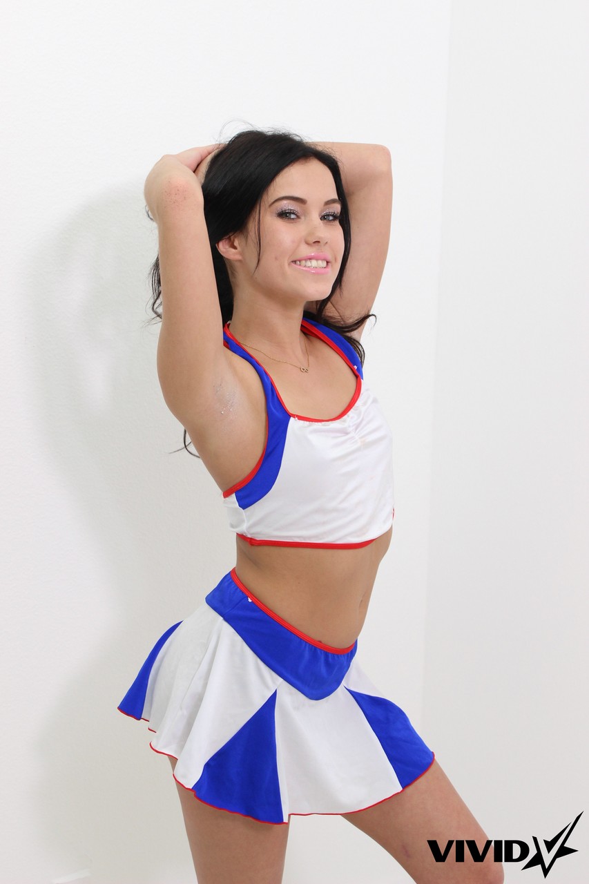 Dark-haired cheerleader Megan Rain works her phat ass while getting naked foto porno #422749920