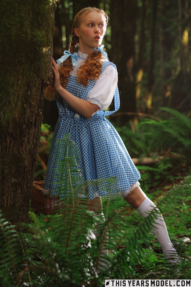 Charming redhead teen Dolly Little gets naked in white socks while in a forest foto porno #424056414