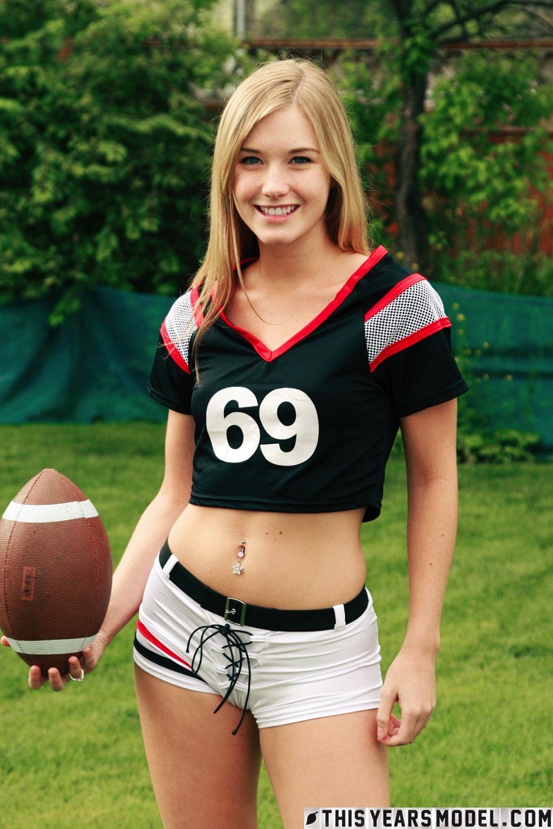 Beautiful blonde Jewel doffs sportswear to pose nude while holding a football porn photo #424152279