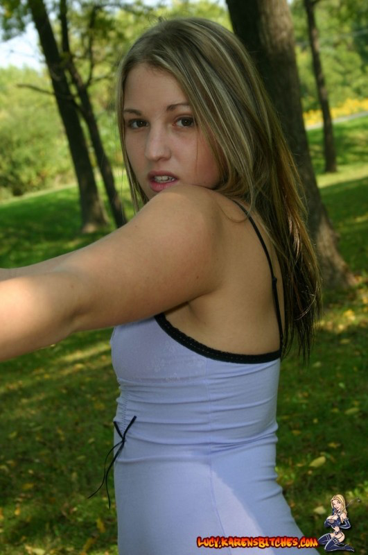 Amateur teen goes for a walk in the park attired in a short dress porn photo #425535405