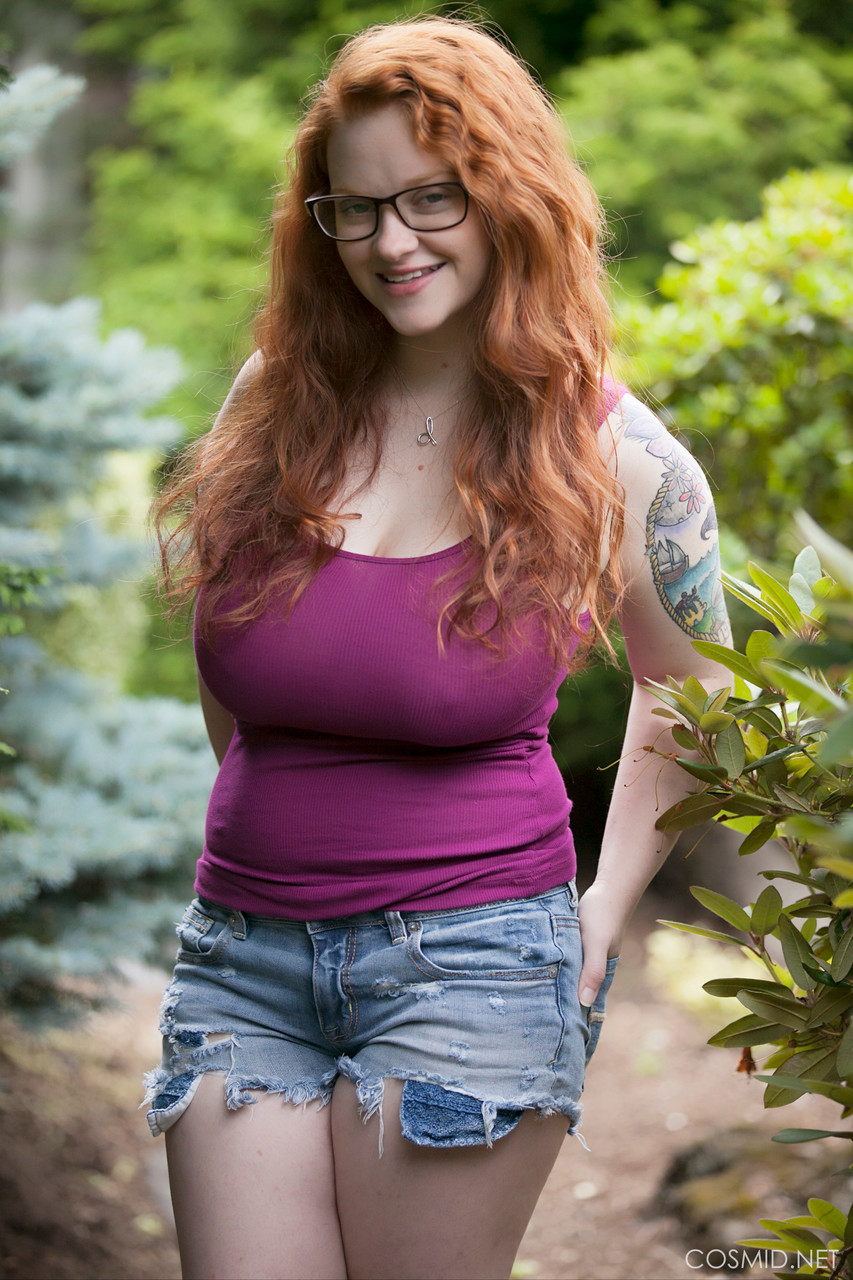 Natural redhead teen exposes her thick body and big saggy boobs in the woods porn photo #424274749