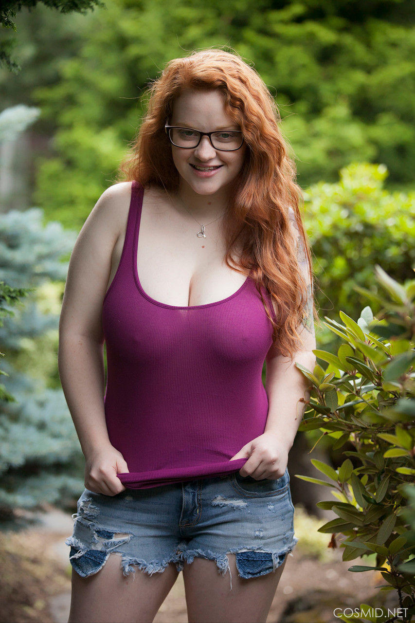 Natural redhead teen exposes her thick body and big saggy boobs in the woods porn photo #424274750