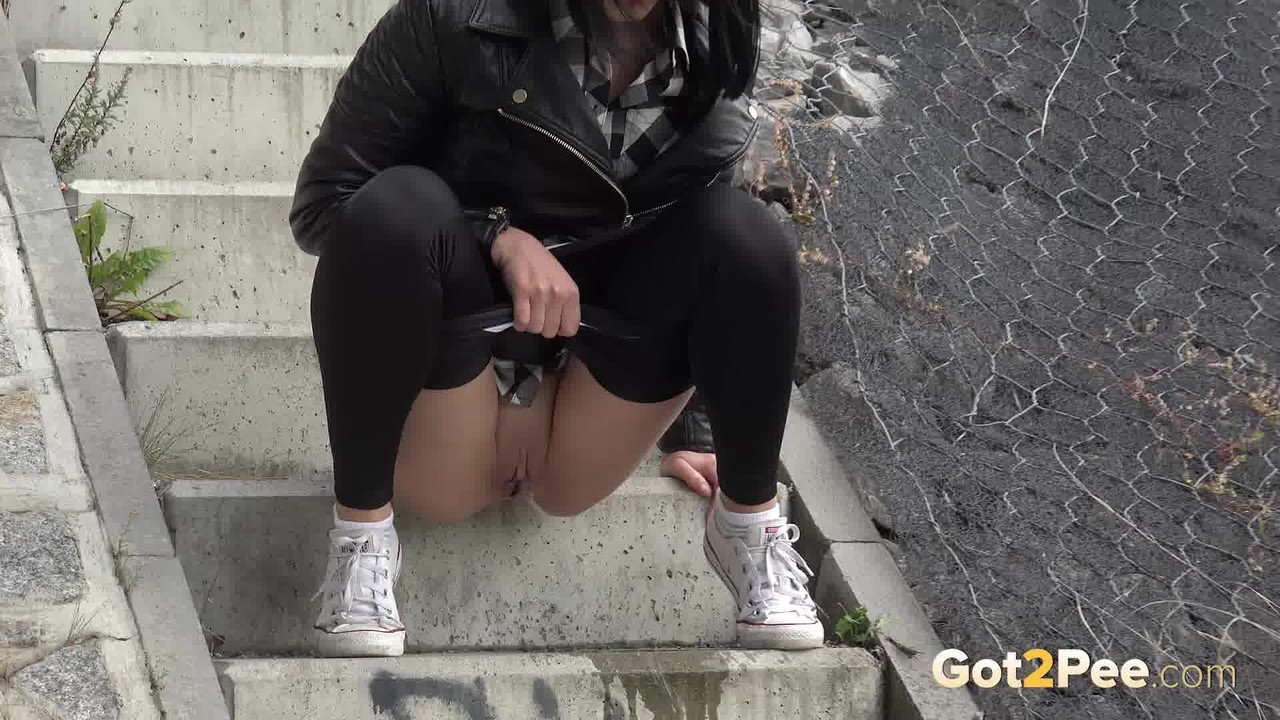 Dark haired girl Dee pulls down her leggings for a pee on concrete stairs porn photo #428726537