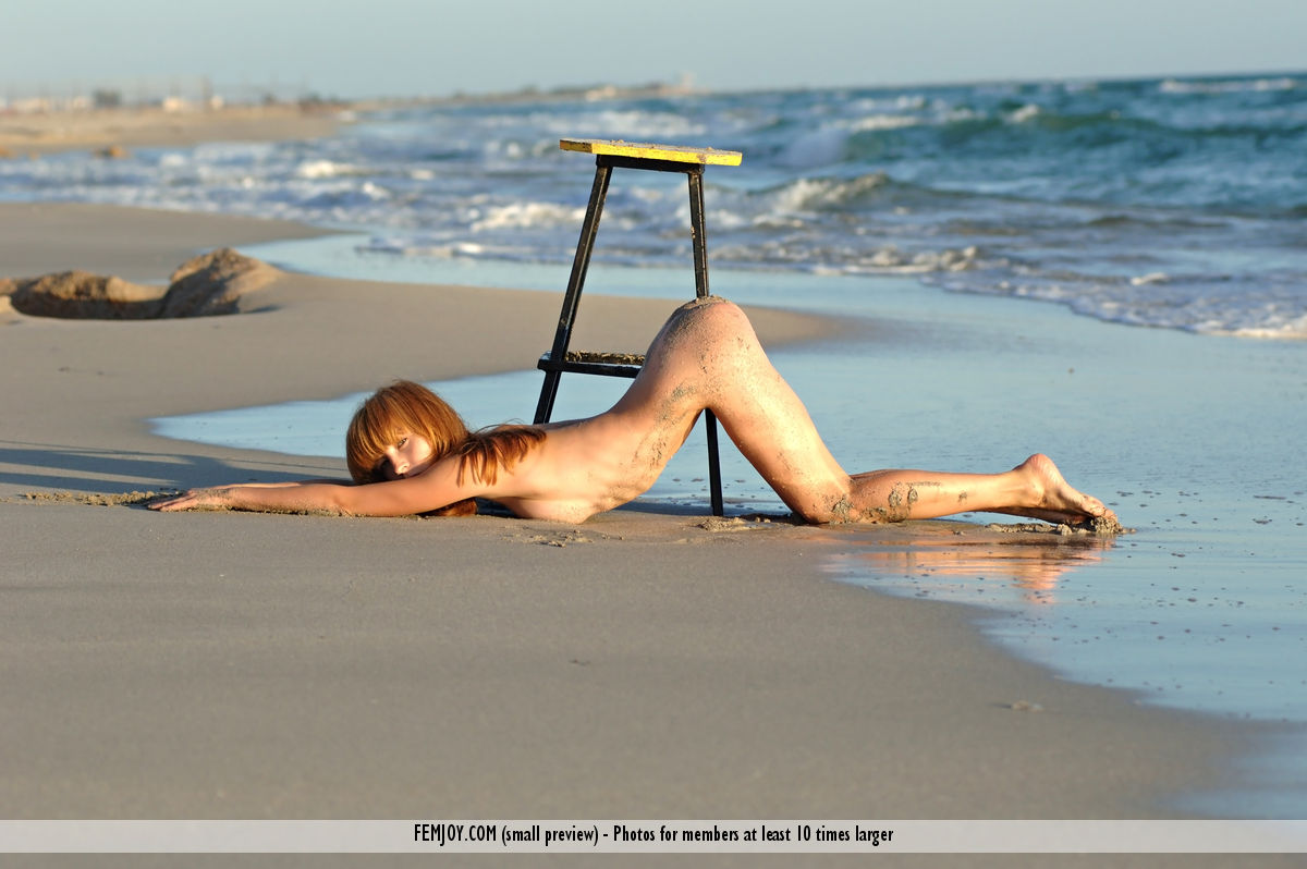Gorgeous sexy redhead Birgid poses her hot body nude with a stool at the beach porn photo #425010558